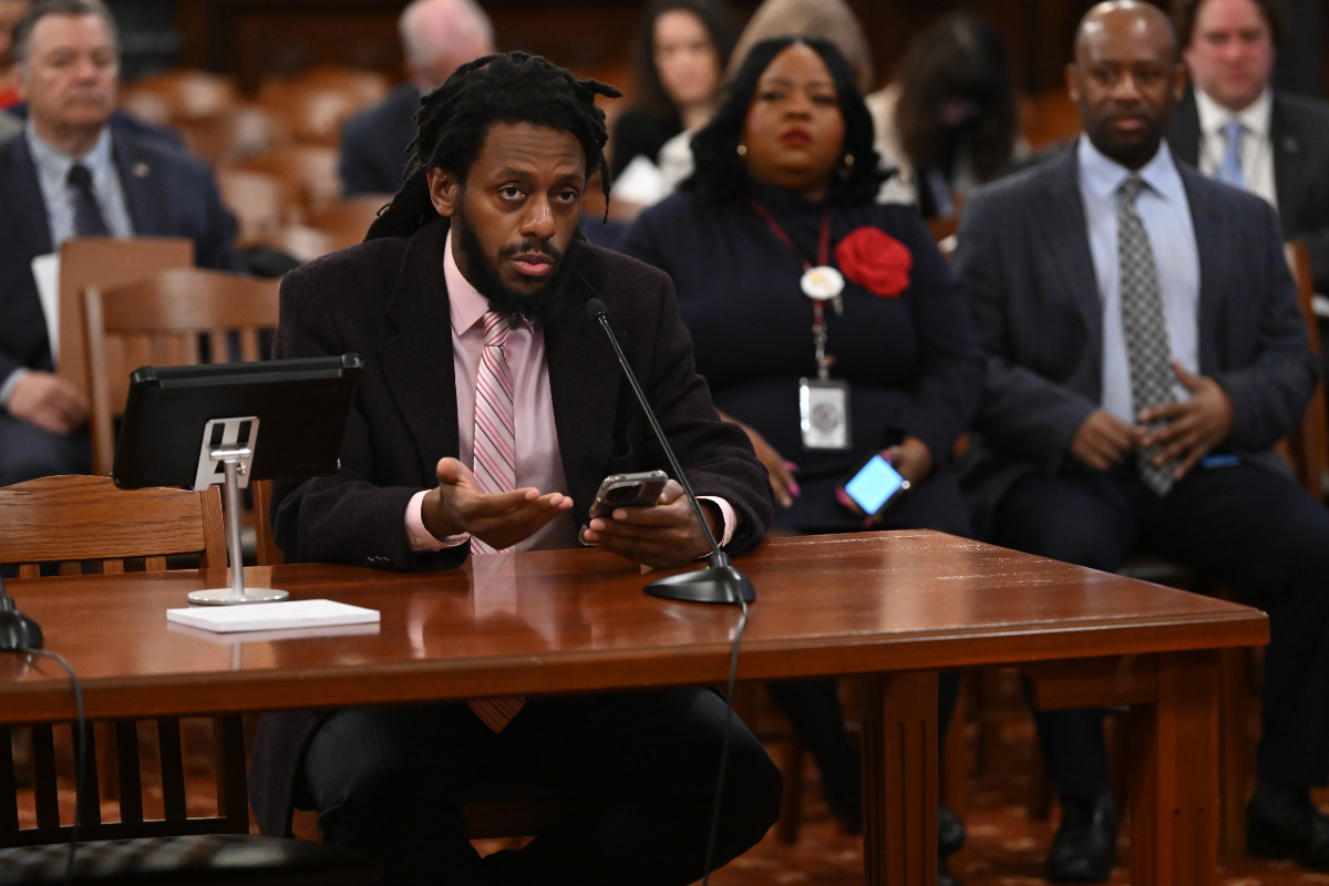 State Senator Mike Simmons in committee