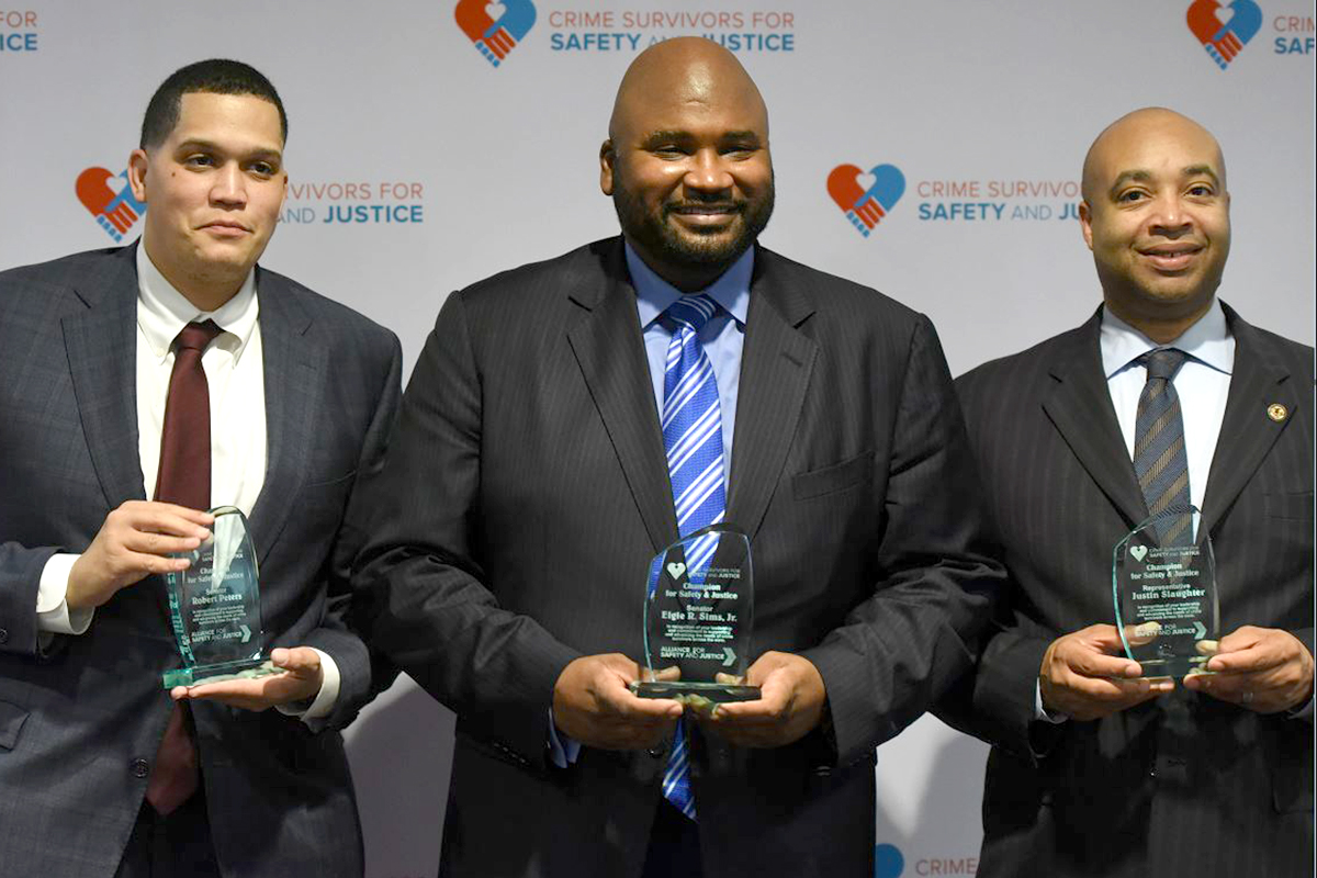 (right to left): Sen. Robert Peters; Sen. Elgie R. Sims, Jr.; Rep. Justin Slaughter