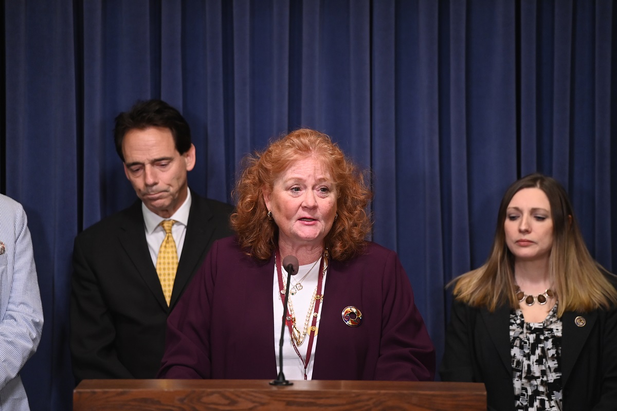 State Senator Laura Murphy speaks at a press conference